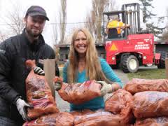 So, this is a photo, borrowed from the Port Townsend Leader (thanks), of Arrow Lumber's main guy in our area, Cadian. Maybe I read or heard his last name once, but... What's pertinent is that, every time I've gone in there, if he's around the counter, there's surf talk. And I've been going there, first for pellets for my stove, then, when that went into broke-mode, for building supplies. I should mention that Arrow Lumber has the lead on the coolness meter for such places, totally thrashing The Depot, largely because the people working there (and originally there was only Cadian, PT local) seem to give a shit. And they give back, evidenced by the photo. Not that is really pertinent. Cadian has surfed the legendary and mysterious surf spot, Green Point... and I haven't. But I will. So, on my most recent trip, purchasing some 2 by 4s so I can get a roof on the greenhouse/studio I'm building with a lot of windows I got from a job where they replaced all of them because two had lost their seal, Cadian and this other guy started telling me I should be surfing on such a fine hot day. "But there's no surf," I said, "even on the coast." "There's surf in Maui," this other guy, always up on the latest blue collar gossip, said, "and Kauai. Last time I was there..." "And on the north shore," Cadian added. "I've been there, and the waves are sooo..." Then, after I mentioned the US Open was held in ankle snappers at Huntington Pier, we had to discuss wave size. I held my hand even with my chin. "Four foot, Californian." "I saw these waves at Sunset Beach," Cadian said, "and I said, 'got to be eight feet.' This Hawaiian guy said, 'No, Bra, four feet... Hawaiian.' So... um, Erwin, what did you want again?" "Eight 2 by 4s, 12." After another customer approached the counter, Cadian added that maybe I wanted nine, I had to say, "No, eight twelve footers. (pause) That's eight foot Hawaiian."
